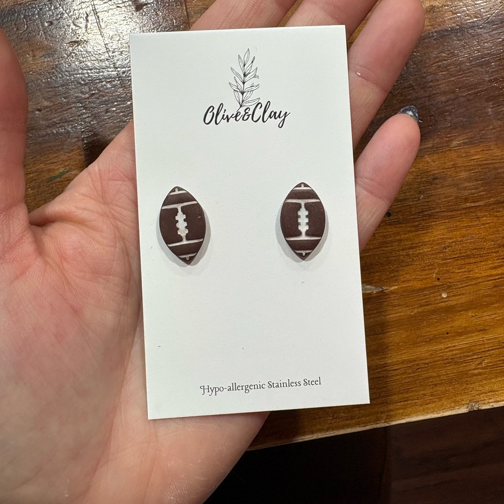 Handmade football polymer clay earrings